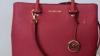 Beautiful magenta Michael Kors leather bag with gold trim