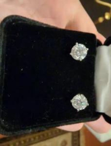 Diamond earrings selling for 5000$ appraised$ 12,500.00