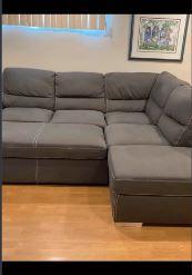 Leon’s sofa bed sectional couch with ottoman