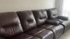 Reclining leather sofa