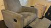 Grey rocking recliner armchair